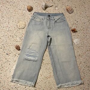 Stylish High Rise Light Blue Cropped Jeans with Distressed Design Size 9/29